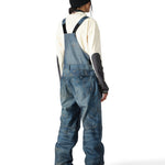 The 686 Women's Black Magic 20K Shell Bib 2025 is shown from the back in a black color with adjustable straps and belt loops.