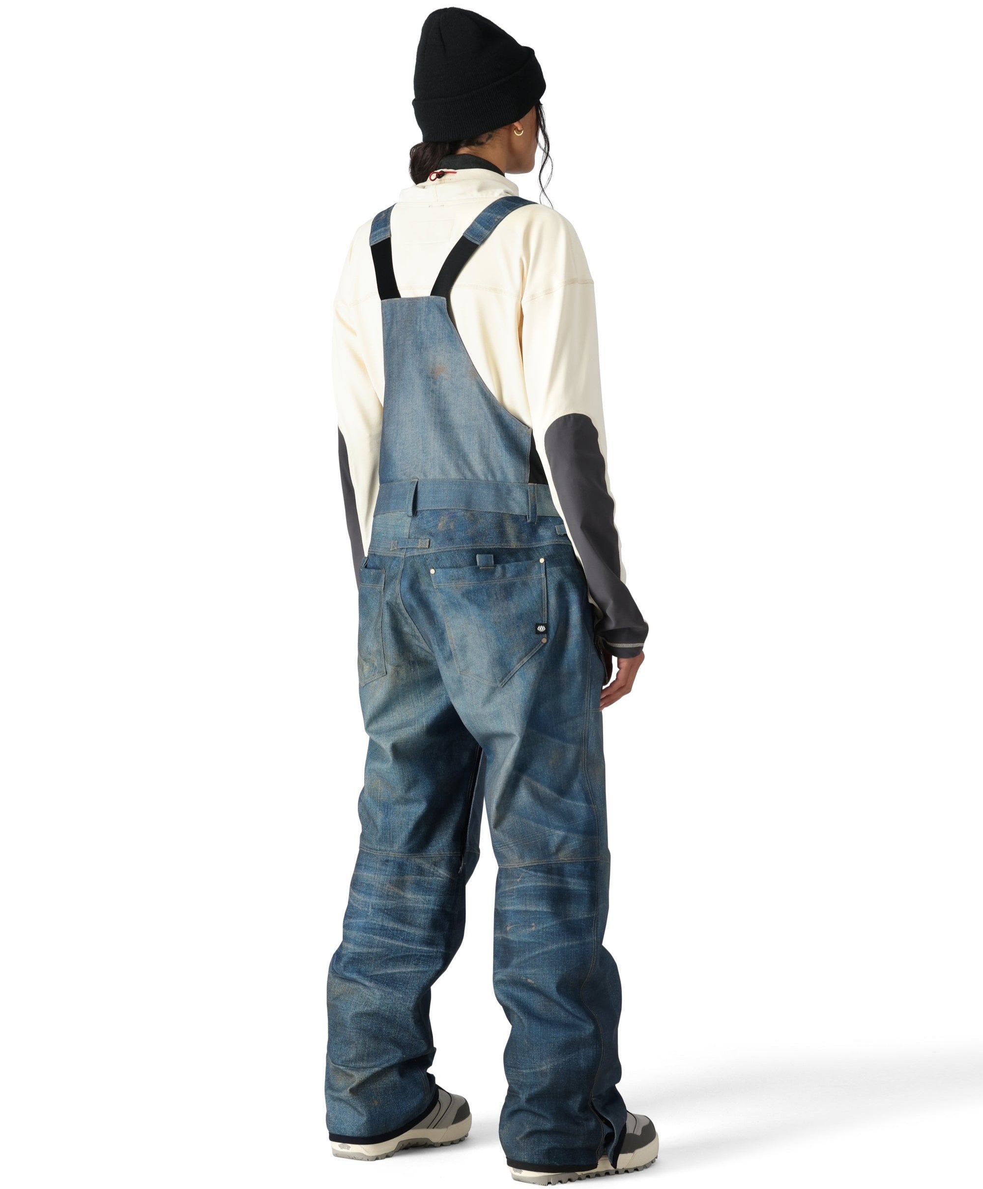 The 686 Women's Black Magic 20K Shell Bib 2025 is shown from the back in a black color with adjustable straps and belt loops.