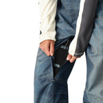 The 686 Women's Black Magic 20K Shell Bib features a black bib and leg panels with white trim.