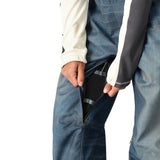 The 686 Women's Black Magic 20K Shell Bib features a black bib and leg panels with white trim.