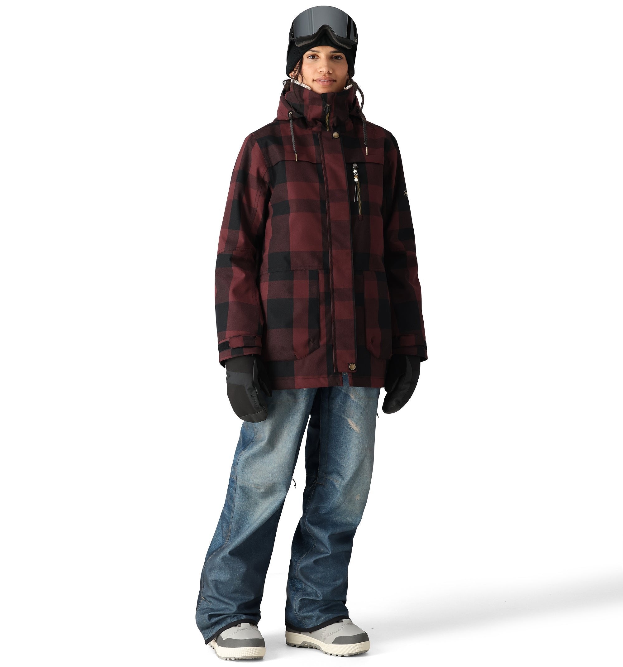 The 686 Black Magic 20K Shell Bib has a black and white checkered pattern on the front view.