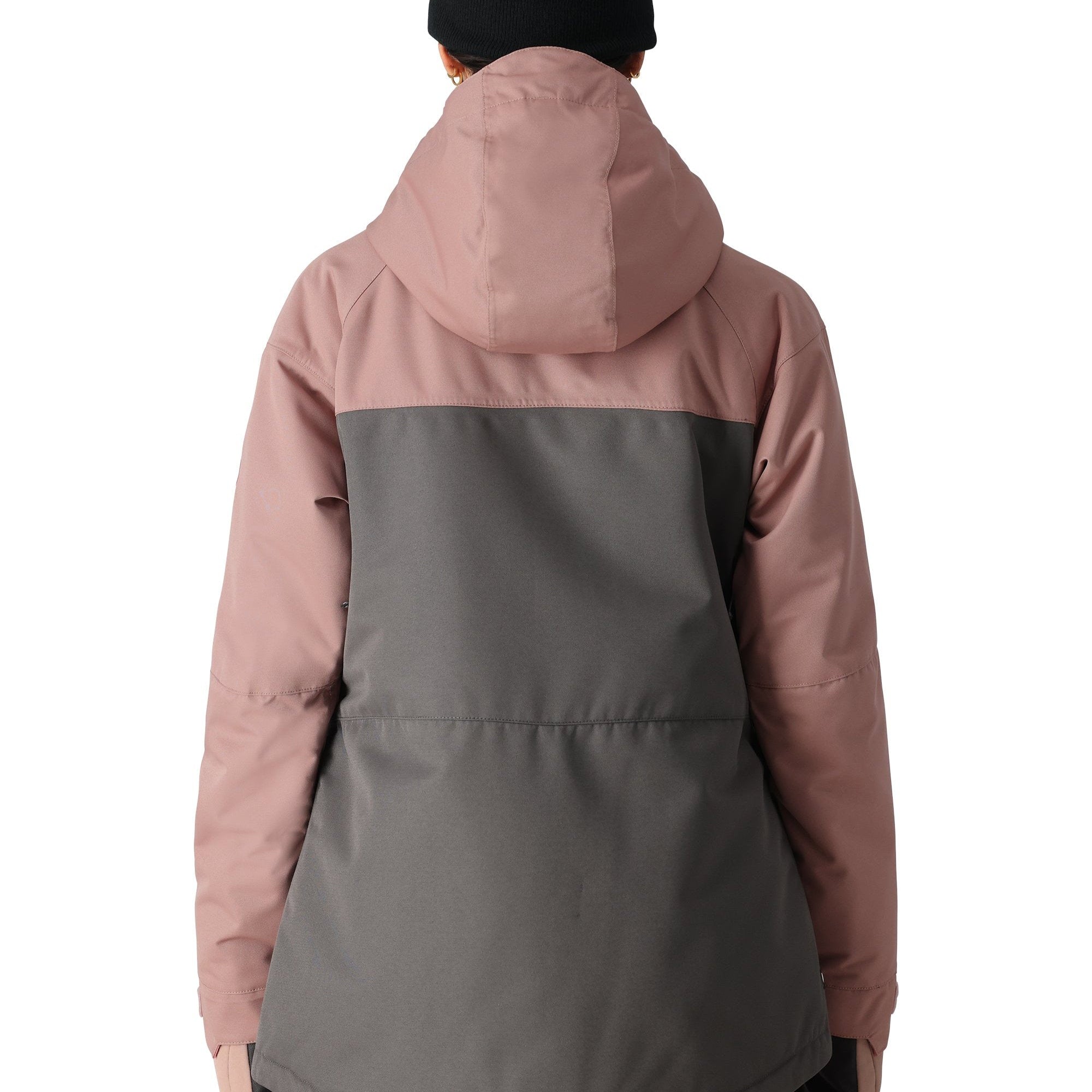 The 686 Women's Athena Insulated Jacket 2025 has a pink and grey color scheme with a hood visible on this back view.