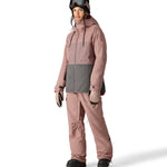 The 686 Women's Athena Insulated Jacket 2025 is primarily dusty rose with a gray panel at the waist.