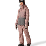 The 686 Women's Athena Insulated Jacket 2025 is primarily dusty rose with a gray panel at the waist.