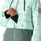 The 686 Women's Athena Insulated Jacket 2025 is primarily light teal with a darker green bottom half and has an insulated hood.