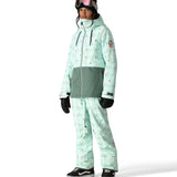 The 686 Women's Athena Insulated Jacket 2025 has a light green color with a pattern of small pink and gray snowflakes.