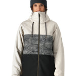 The 686 Women's Athena Insulated Jacket 2025 is predominantly off-white with black accents and has an insulated hood.