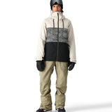 The 686 Women's Athena Insulated Jacket 2025 is primarily white with black accents and a geometric pattern on the upper chest area.