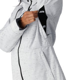 The 686 Women's Athena Insulated Jacket 2025 has a white and black speckled pattern with a black zipper running down the center.