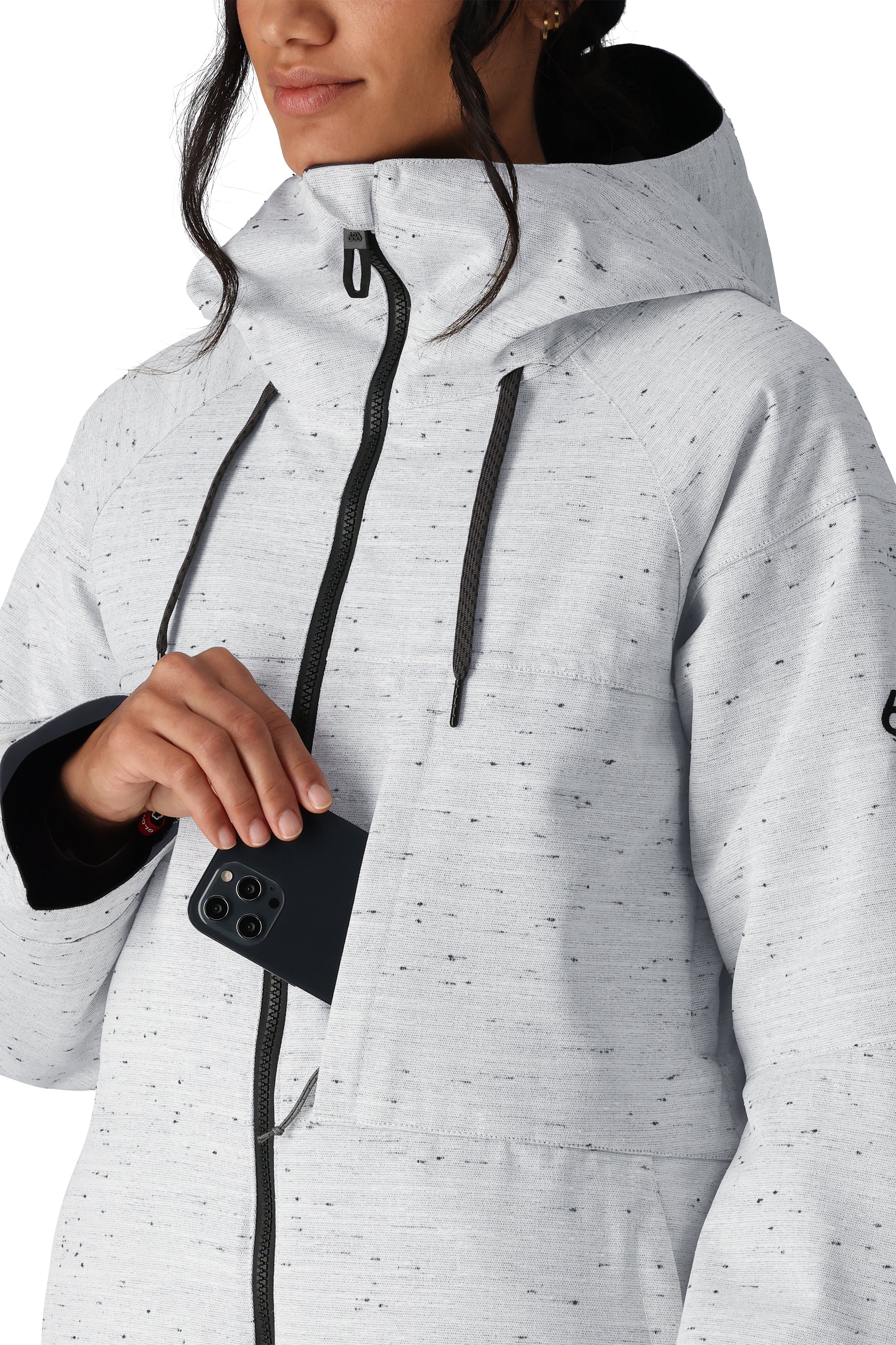 The 686 Women's Athena Insulated Jacket is primarily white with black accents and a high collar.