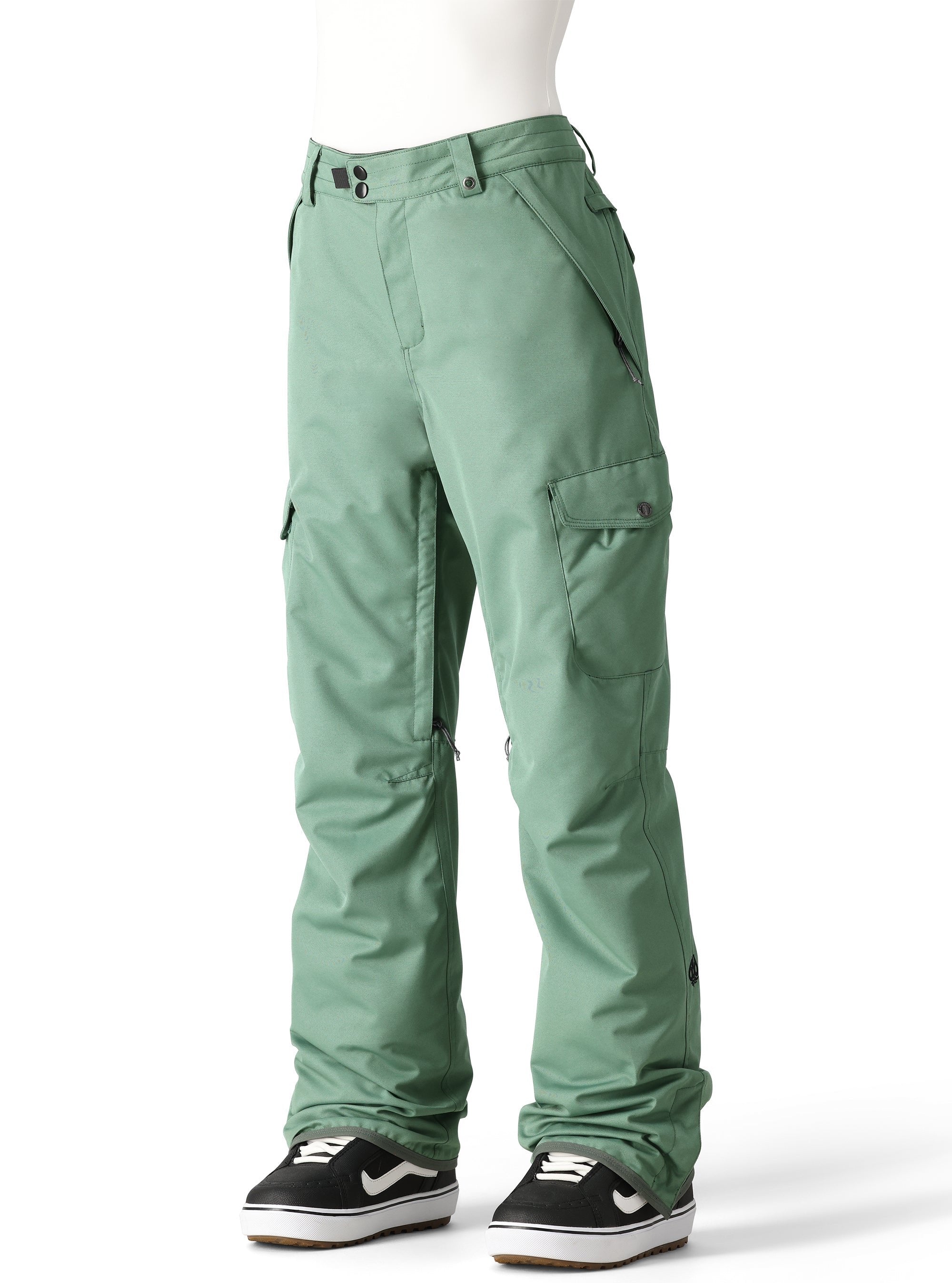 The 686 brand's Aura Insulated Cargo Pant 2025 is showcased in this image from the front, featuring a vibrant green color with a zippered cargo pocket on the thigh.