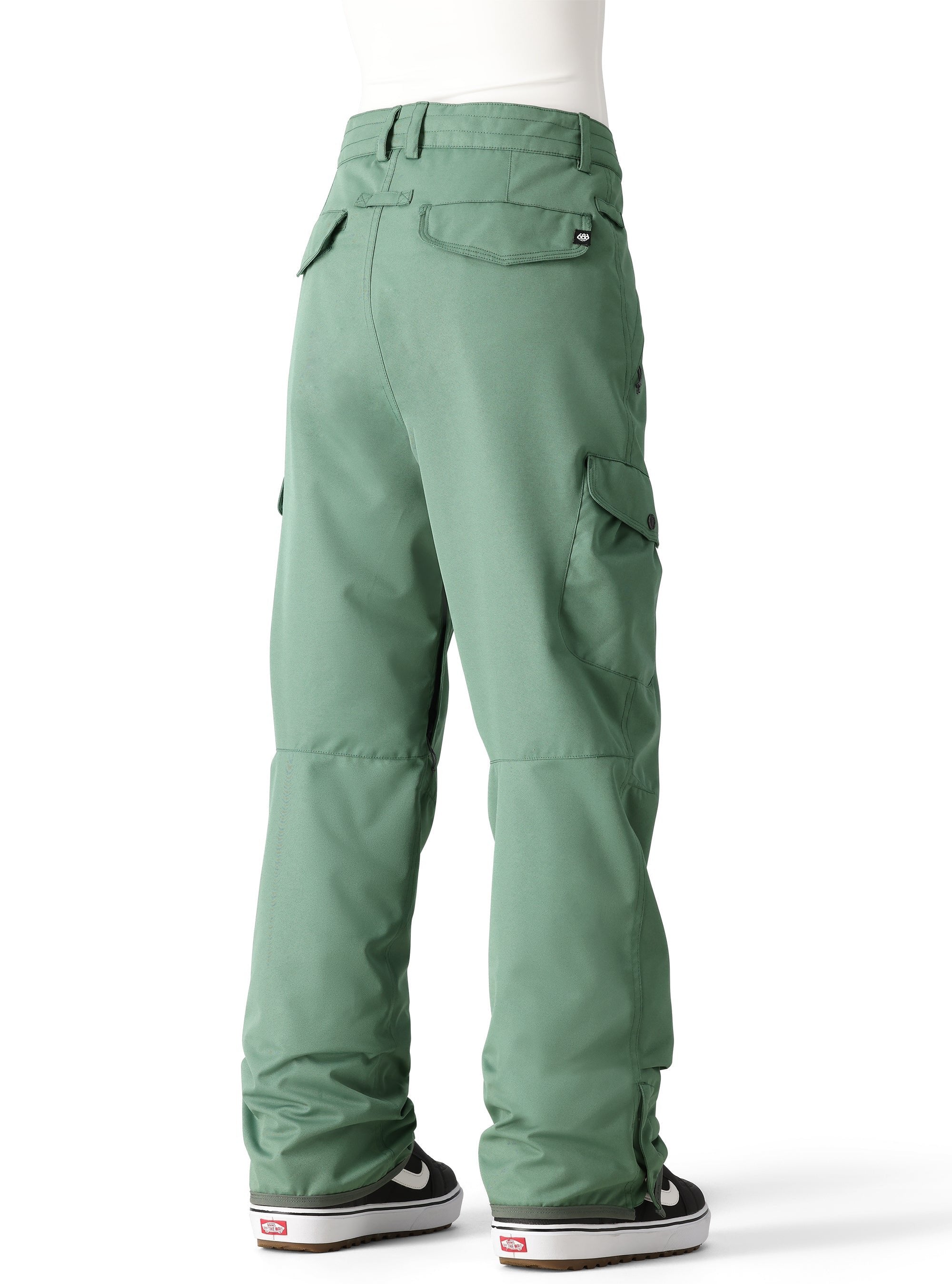The 686 Women's Aura Insulated Cargo Pant 2025 is pictured from behind in sage green with two cargo pockets and belt loops.
