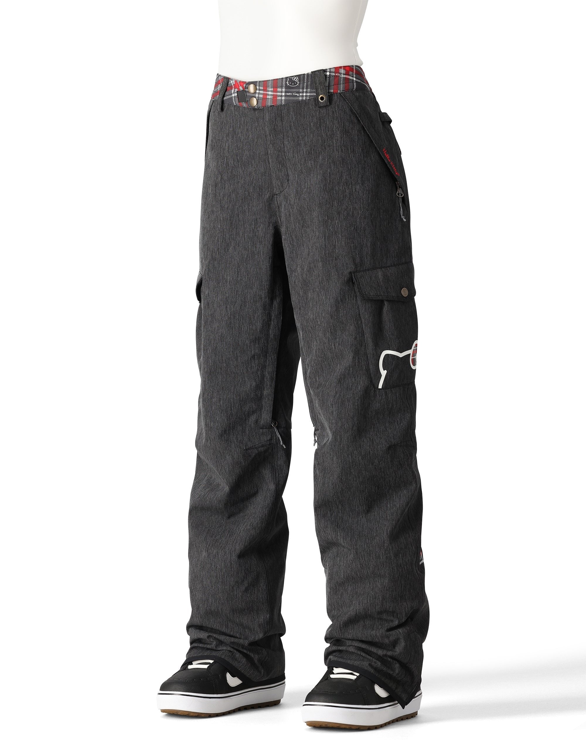 The 686 brand's Aura insulated cargo pant, seen here from the front in dark gray with red plaid accents at the waistband and white stitching.