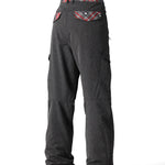 The 686 Women's Aura Insulated Cargo Pant 2025 in dark gray has two cargo pockets on either side and a red, white, and gray plaid waistband.