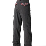 The 686 Women's Aura Insulated Cargo Pant 2025 in dark gray has two cargo pockets on either side and a red, white, and gray plaid waistband.