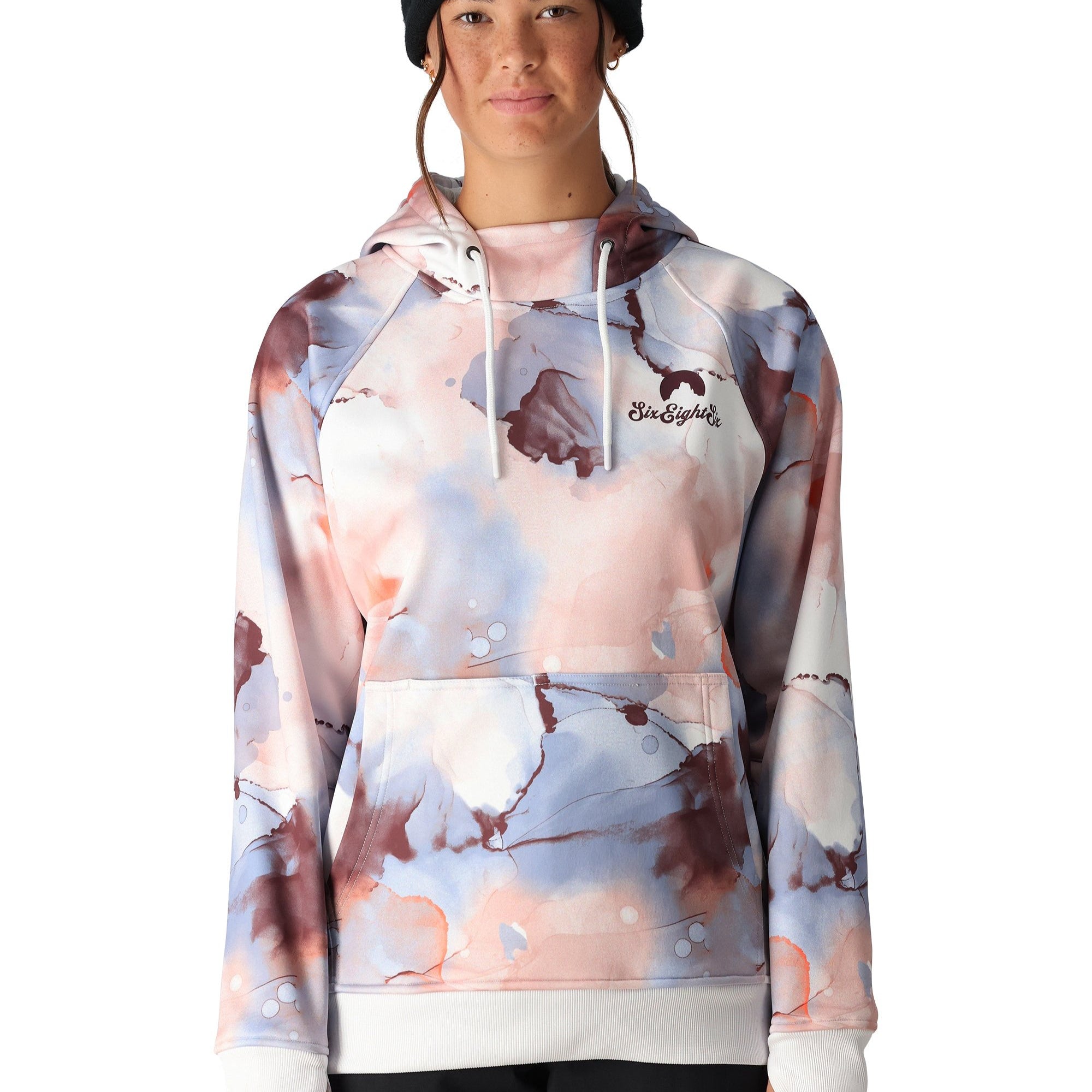 The 686 Women's Bonded Fleece Pullover Hoody 2025 is predominantly white with a marbled pattern of pink, blue, and brown hues.