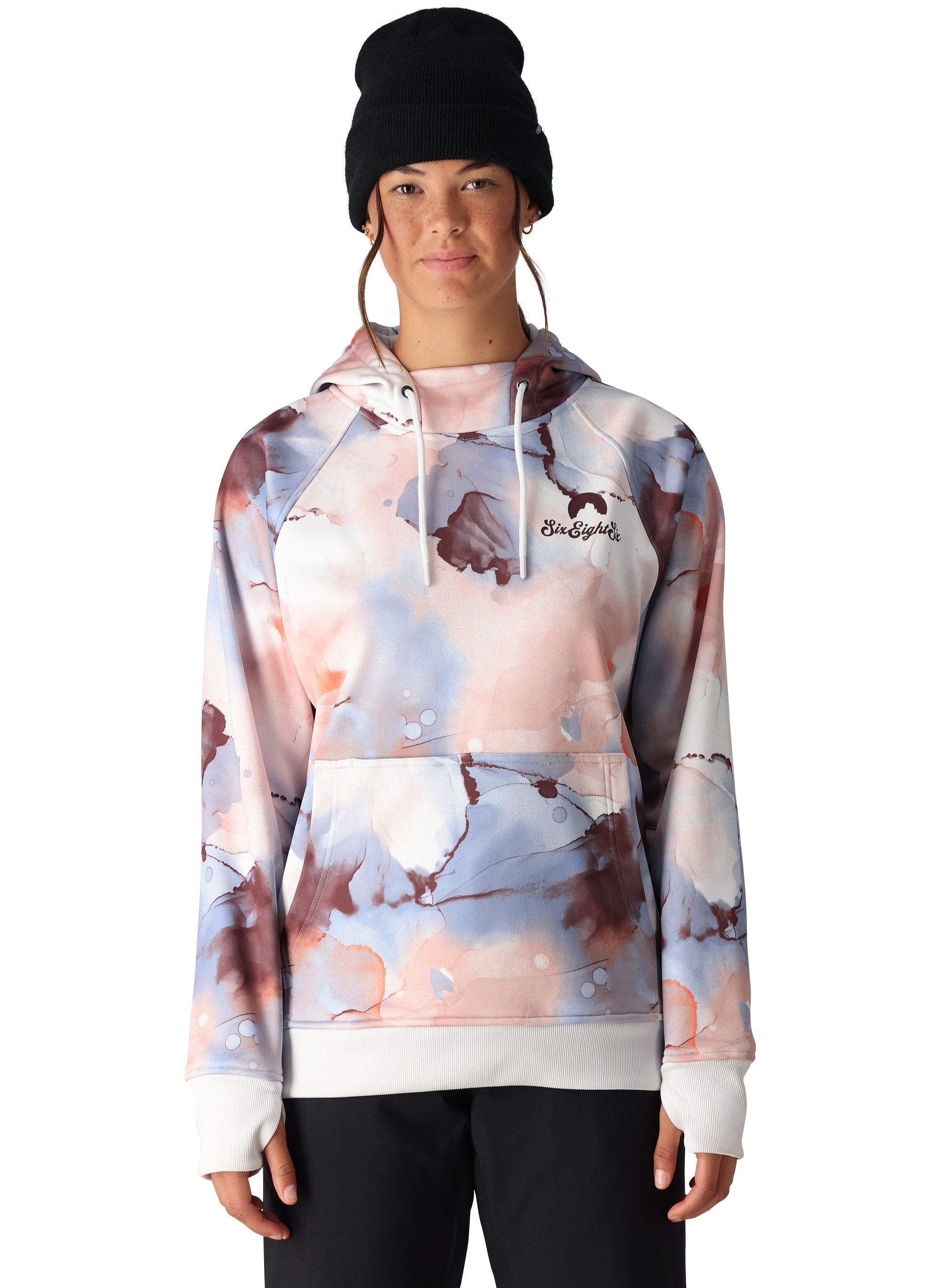 The 686 Women's Bonded Fleece Pullover Hoody 2025 is predominantly white with a marbled pattern of pink, blue, and brown hues.