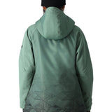 The 686 Women's Fantasia Insulated Jacket 2025 is shown in light green with an insulated hood and a geometric pattern at the bottom.