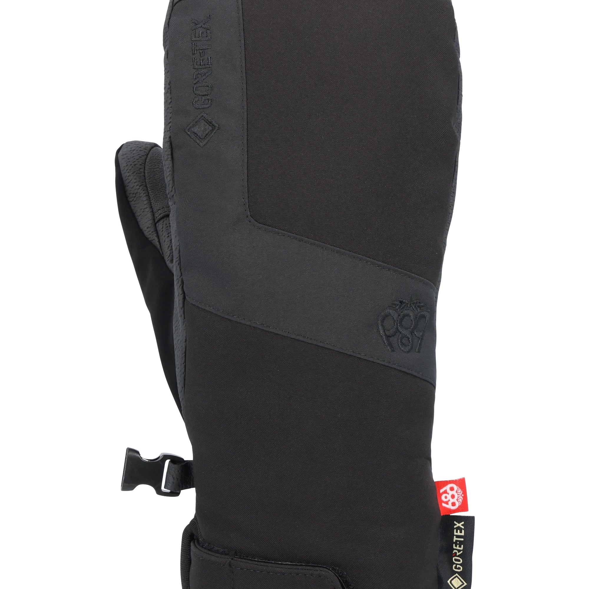 The 686 Women's GORE-TEX Linear Under Cuff Mitt 2025 is black with a textured cuff and a strap closure.