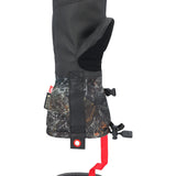 The 686 brand gauntlet mitt in this image features a black and gray camouflage pattern with an orange stripe down the back of the hand.