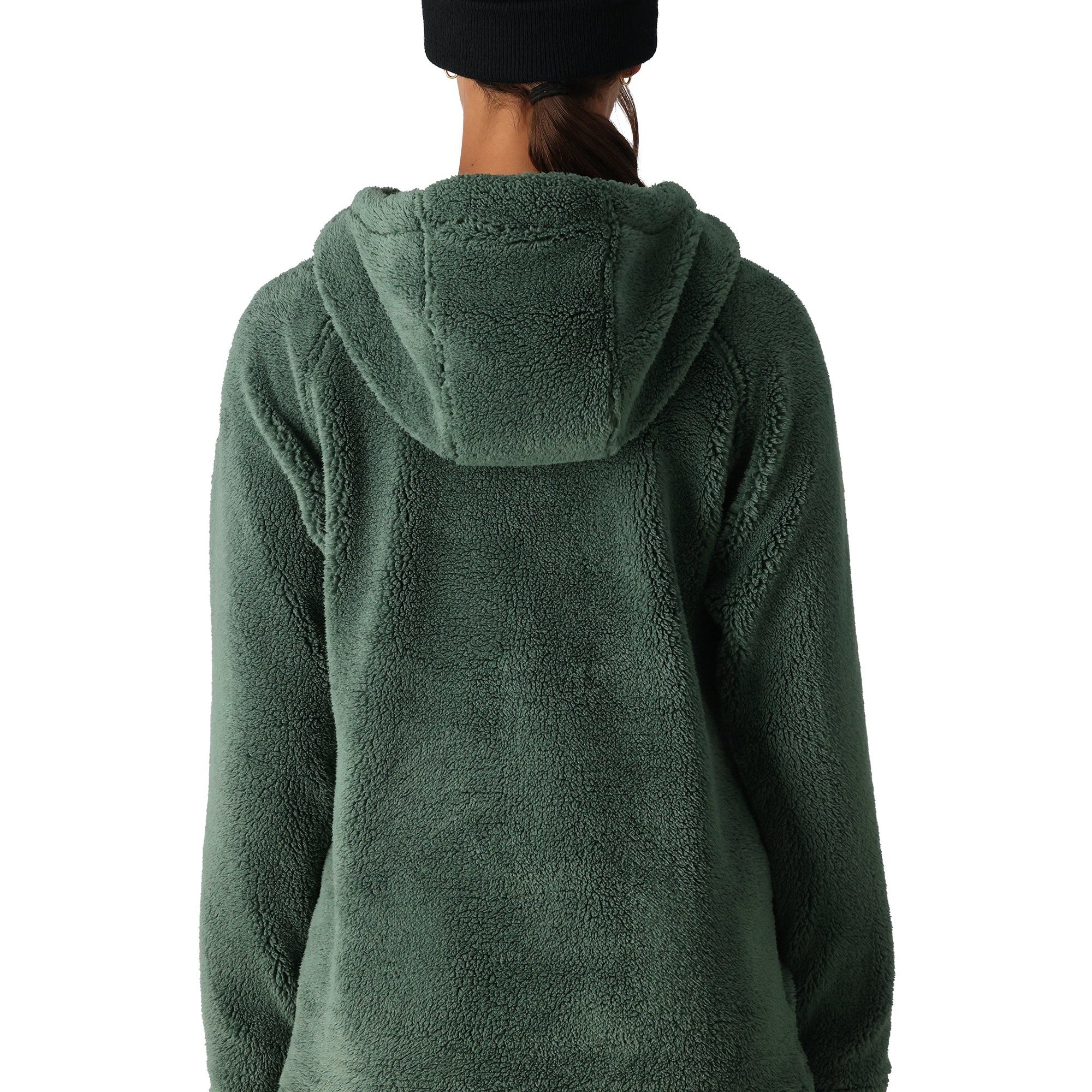 The 686 Women's Hemlock Sherpa Fleece Hoody 2025 is shown in a forest green color with a hood and a zipper on a front view.