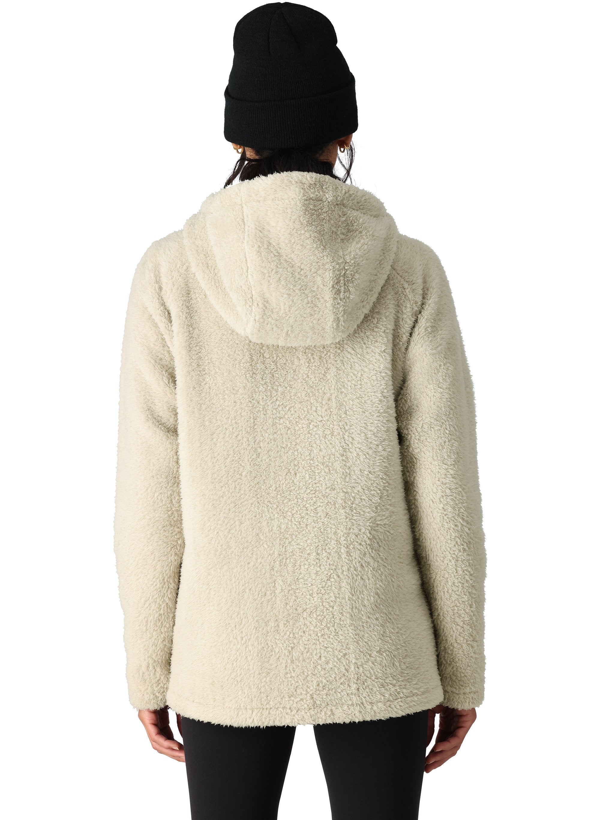The 686 Women's Hemlock Sherpa Fleece Hoody 2025, pictured from behind, has a cream-colored sherpa fleece exterior.