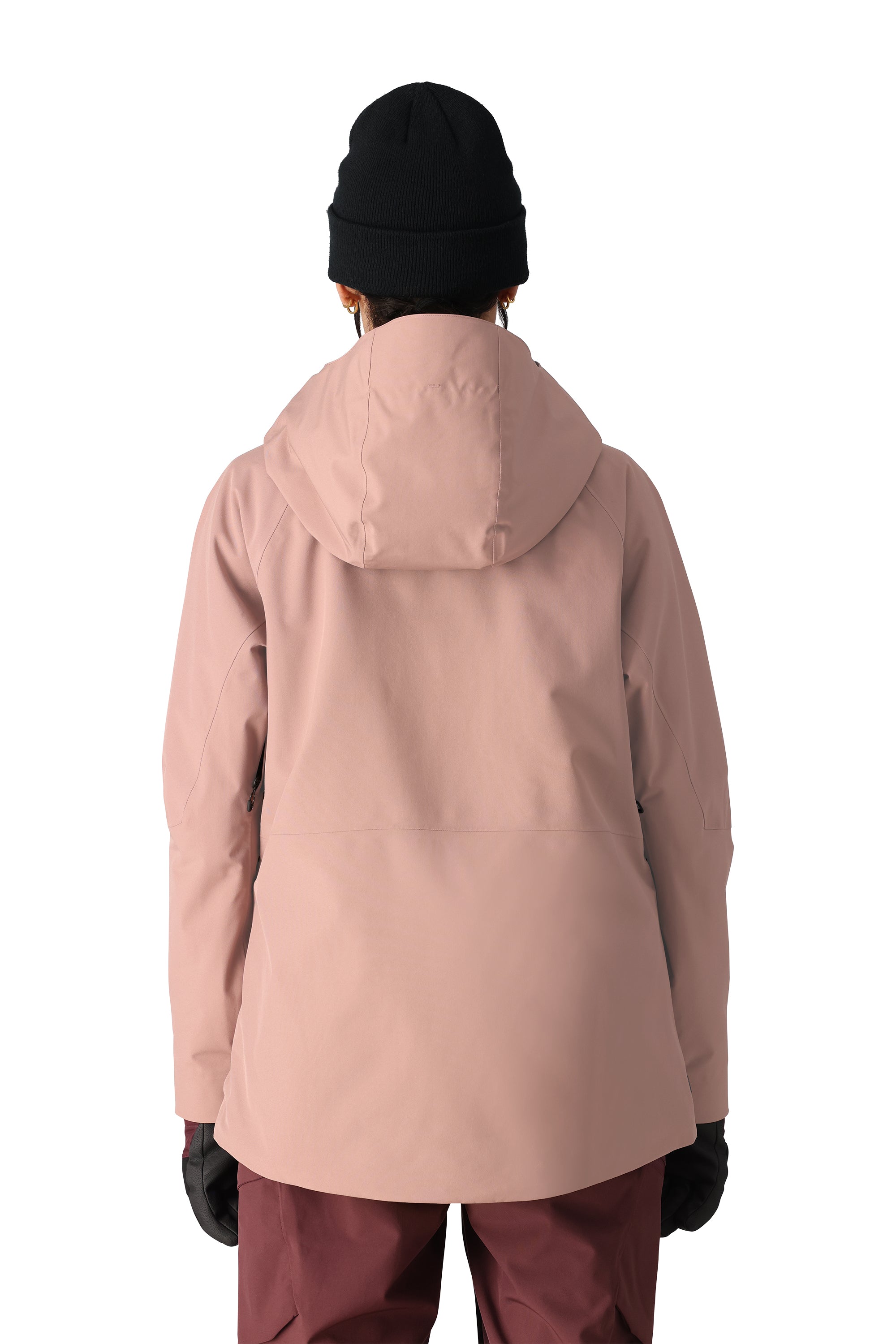 The 686 Woman's Hydra Insulated Jacket 2025 is primarily pink with a hood and visible zipper pockets on either side.