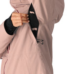 The 686 Woman's Hydra Insulated Jacket 2025 is primarily a dusty rose color with black accents and an adjustable hood.