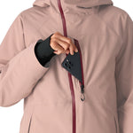 The 686 Woman's Hydra Insulated Jacket 2025 features a light pink color with a burgundy zipper and is shown in a front view.