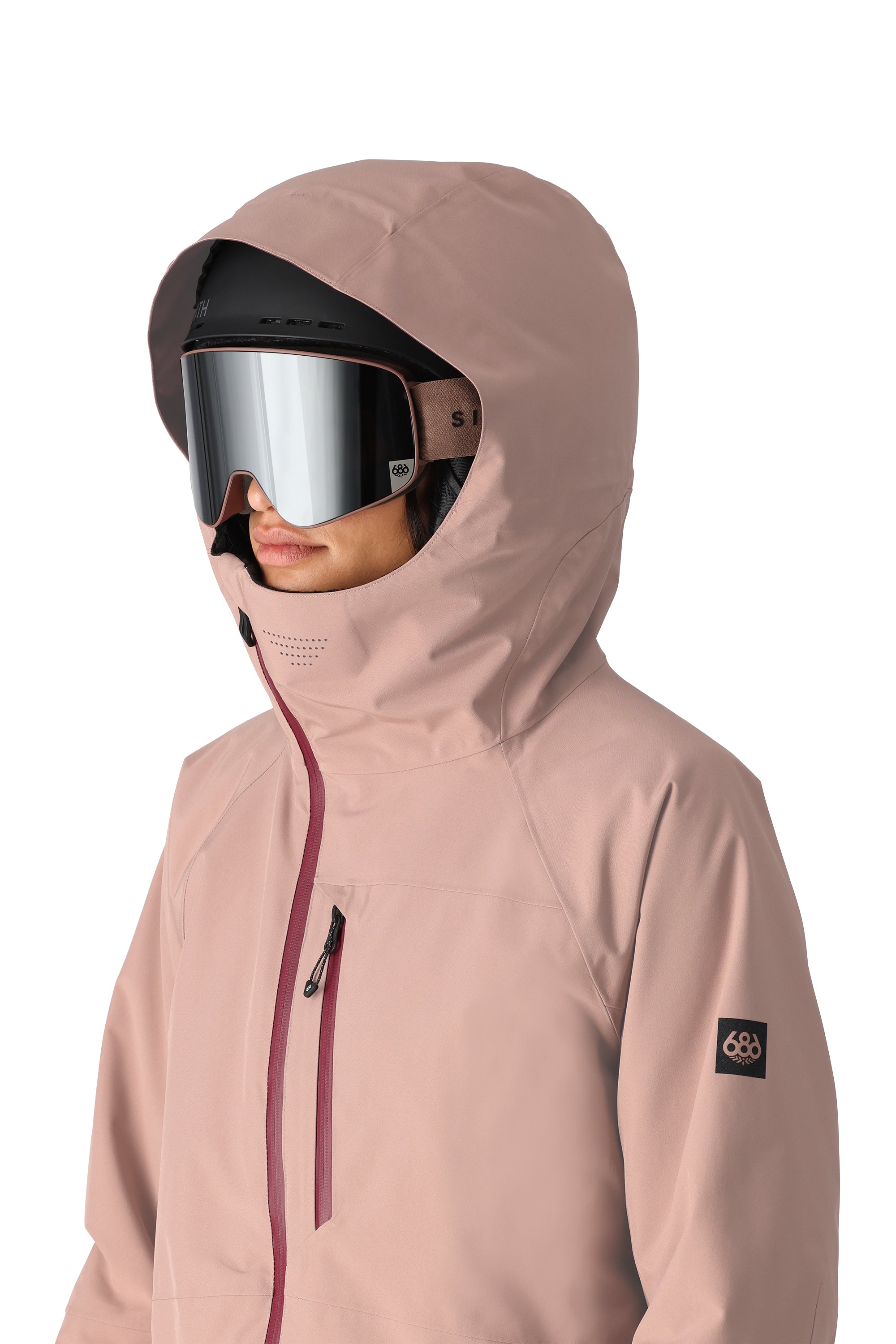 The 686 woman's Hydra insulated jacket has a solid taupe color and a zippered front.