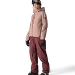 The 686 Woman's Hydra Insulated Jacket 2025 is primarily tan with a red zipper and has a hood.