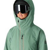 The 686 Woman's Hydra Insulated Jacket 2025 is light green with a hood and a zipper down the front.