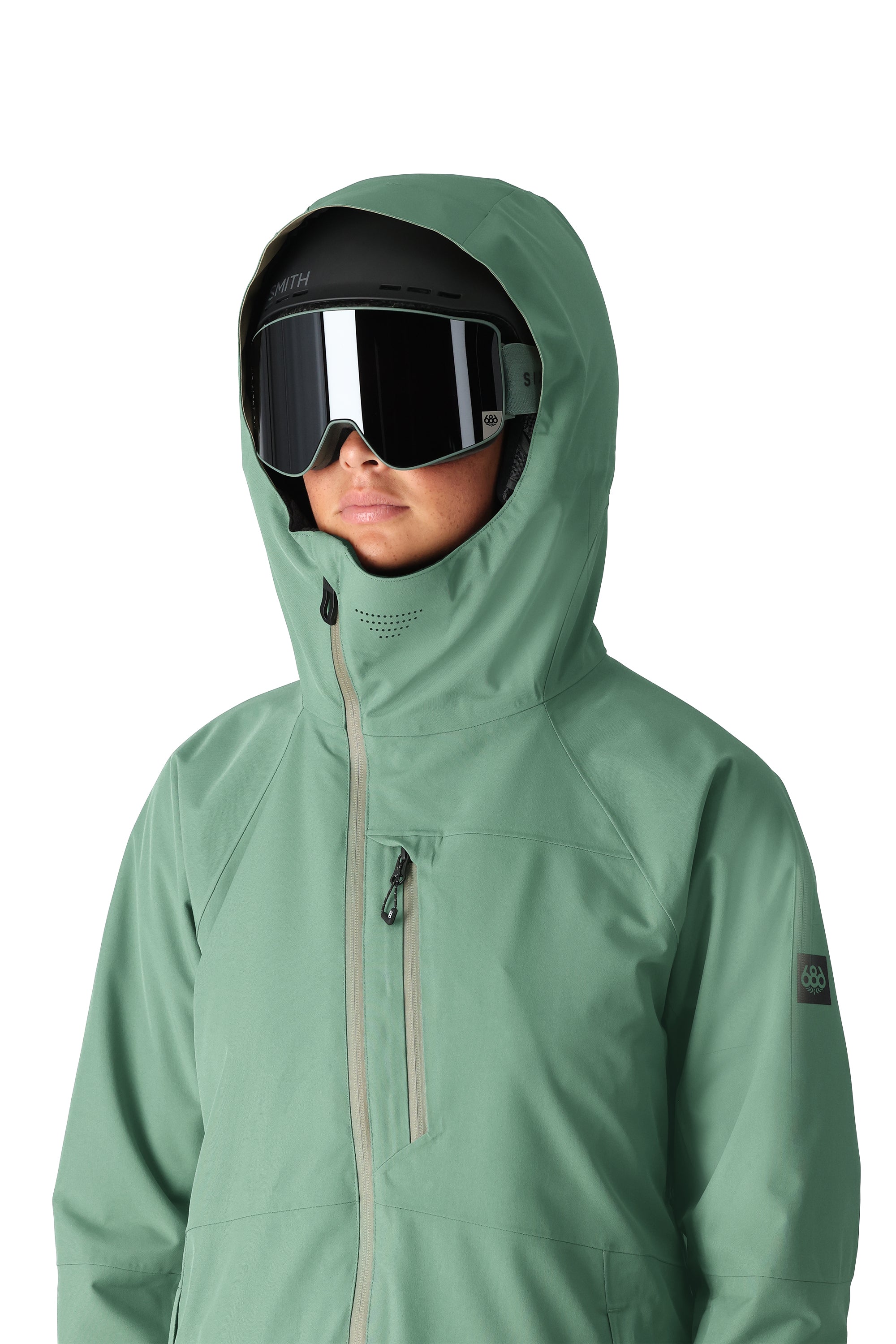 The 686 Woman's Hydra Insulated Jacket 2025 is light green with a hood and a zipper down the front.