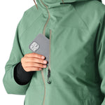 The 686 Woman's Hydra Insulated Jacket 2025 is primarily mint green with black accents and an adjustable hood.