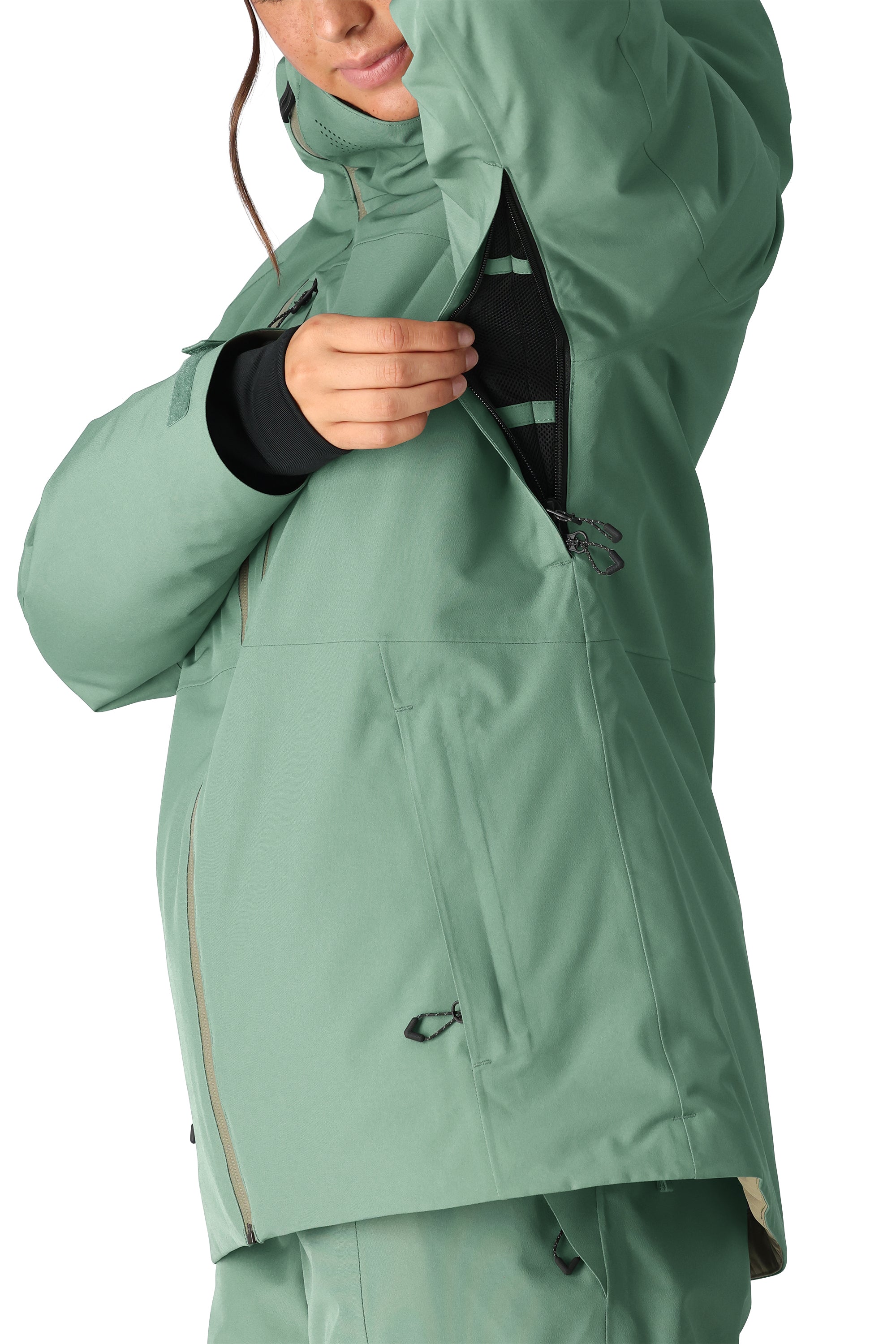 The 686 Woman's Hydra Insulated Jacket 2025 is primarily a sage green color with black accents and has an insulated hood.