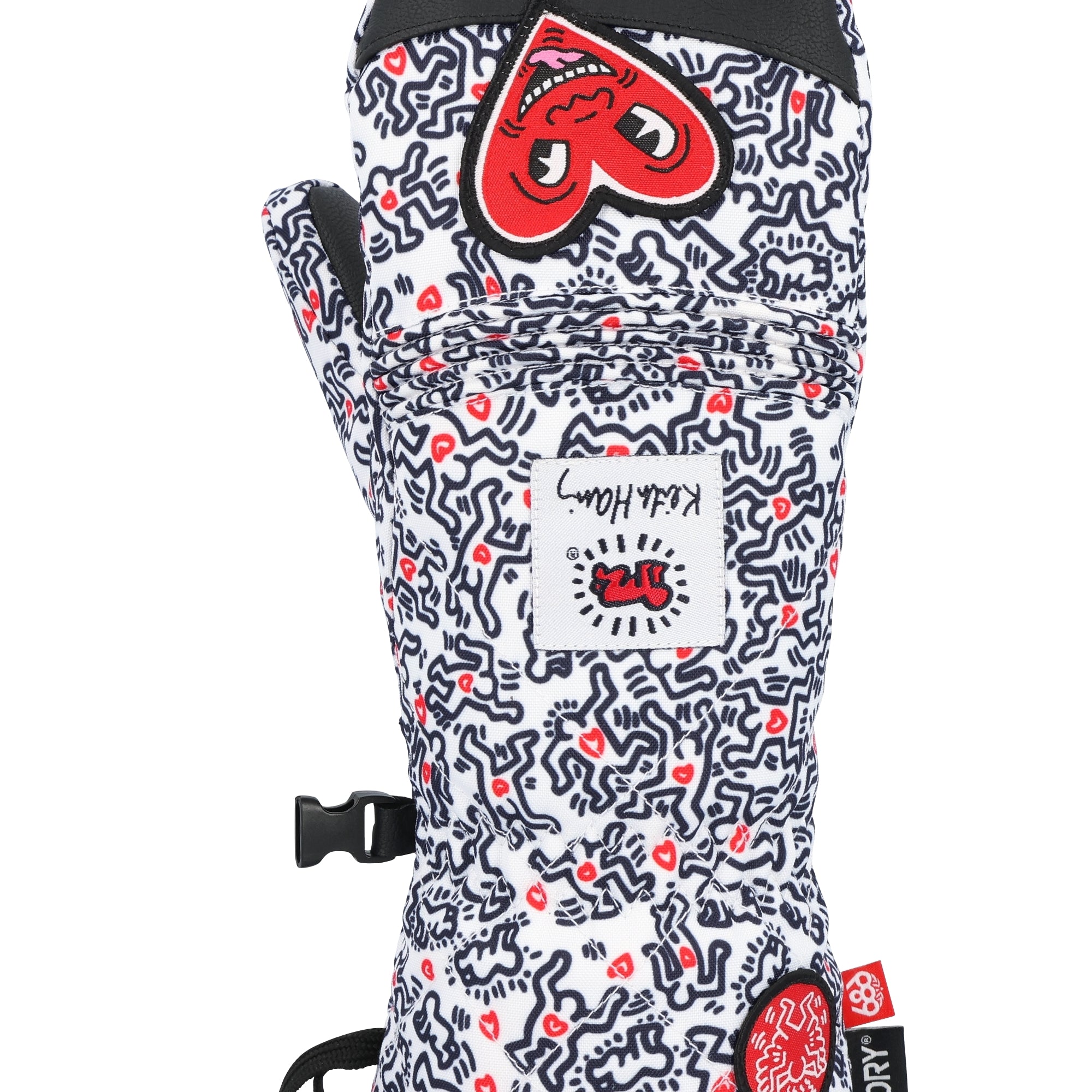 The 686 Women's Jubilee Mitt 2025 in white has a red and black abstract design on the front view with a black cuff at the wrist.