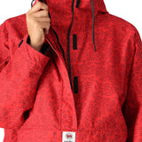 The 686 Women's Outline Shell Anorak 2025 is primarily red with black accents and has a hood.