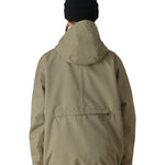 The 686 Women's Outline Shell Anorak 2025 in olive green features an insulated hood and a zippered front pocket.