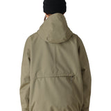 The 686 Women's Outline Shell Anorak 2025 in olive green features an insulated hood and a zippered front pocket.