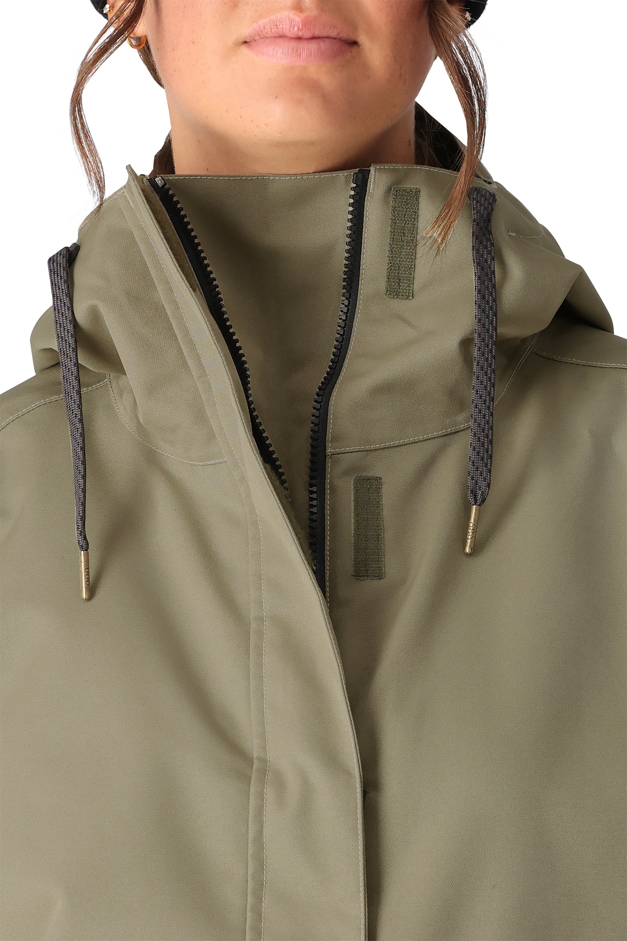 The 686 Women's Outline Shell Anorak 2025 is olive green with a high collar and zip front.