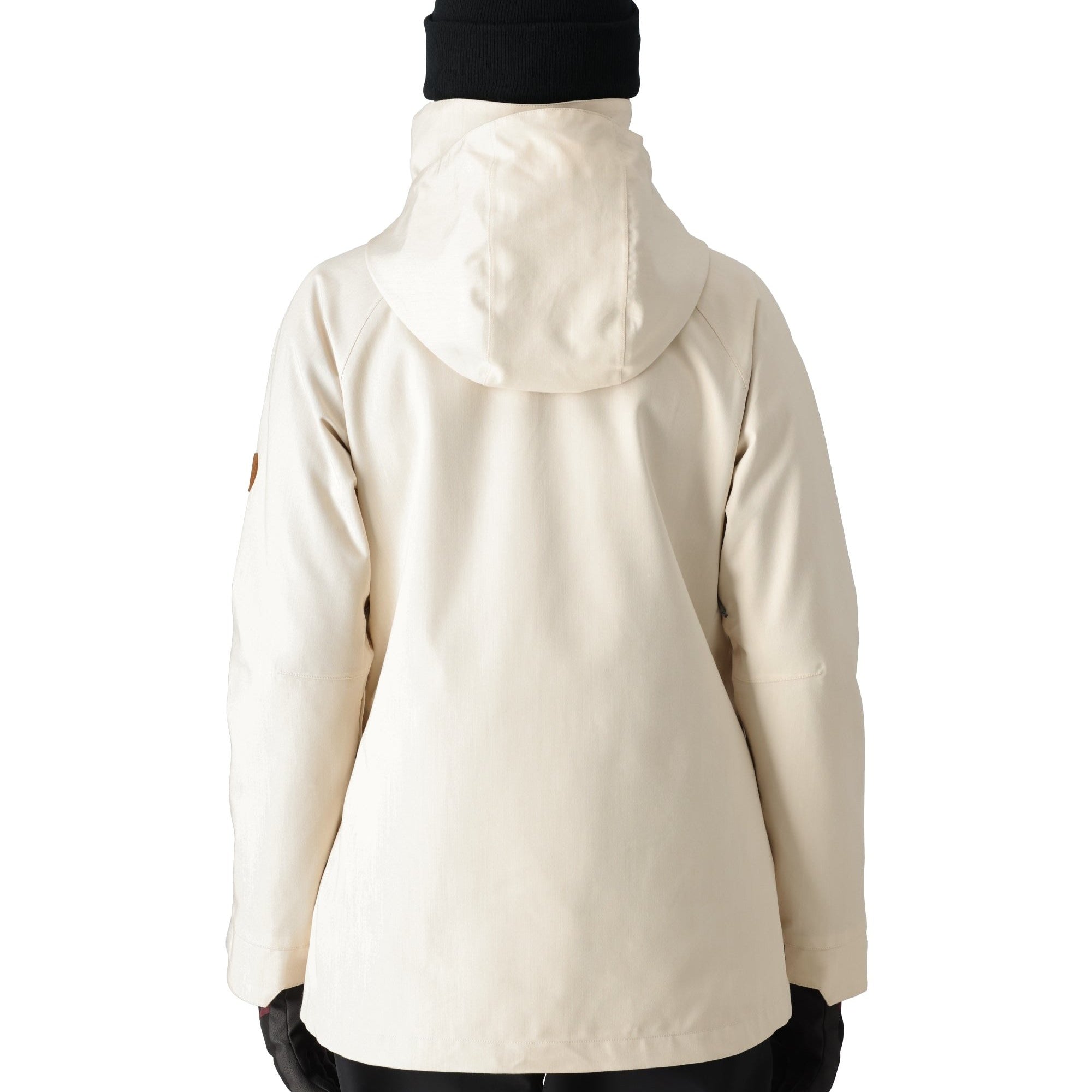 The 686 Women's SMARTY 3-in-1 Spellbound Jacket features a cream-colored front view with a high collar and zippered pockets.