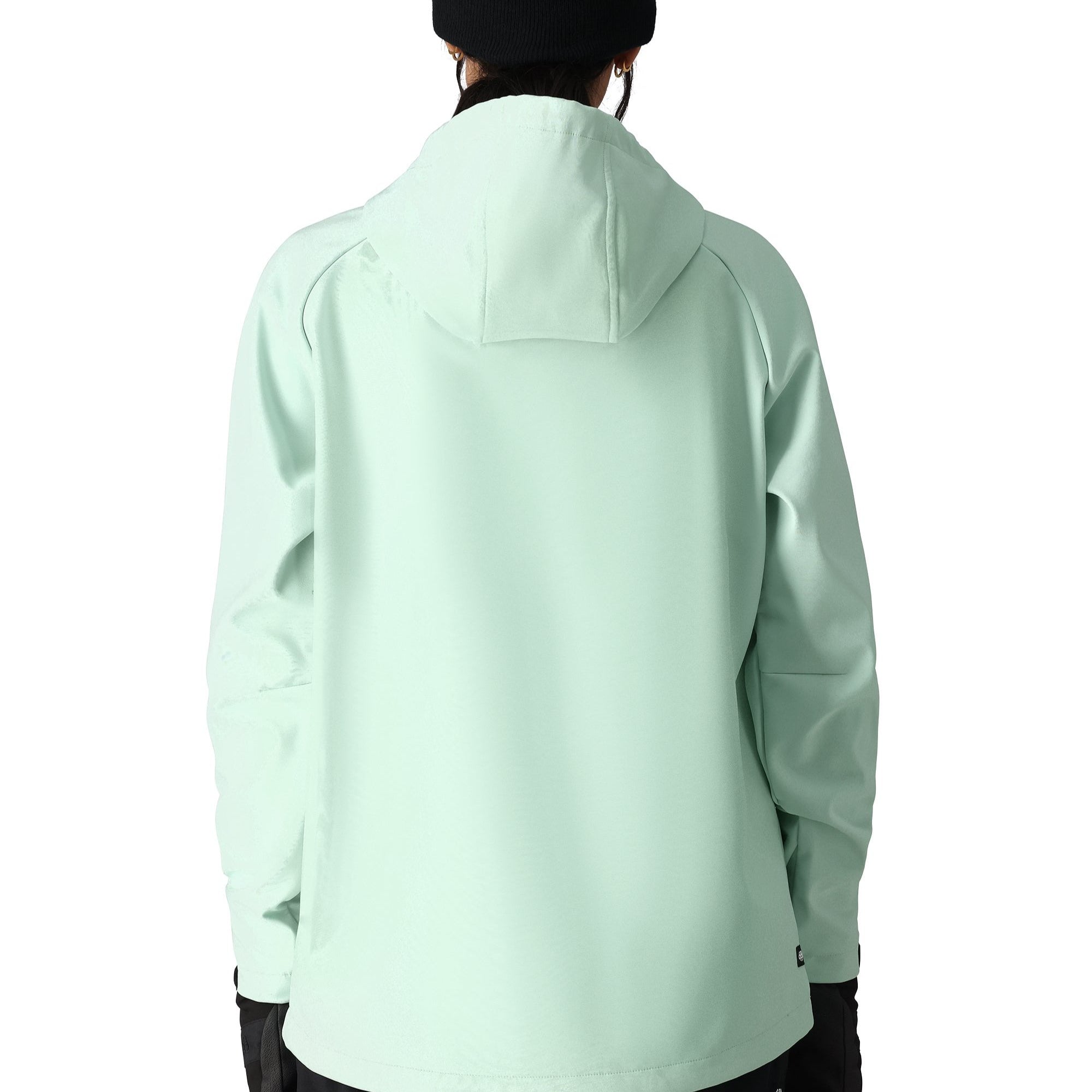 The 686 Women's Waterproof Hoody 2025 is light green with a hood and drawstring.