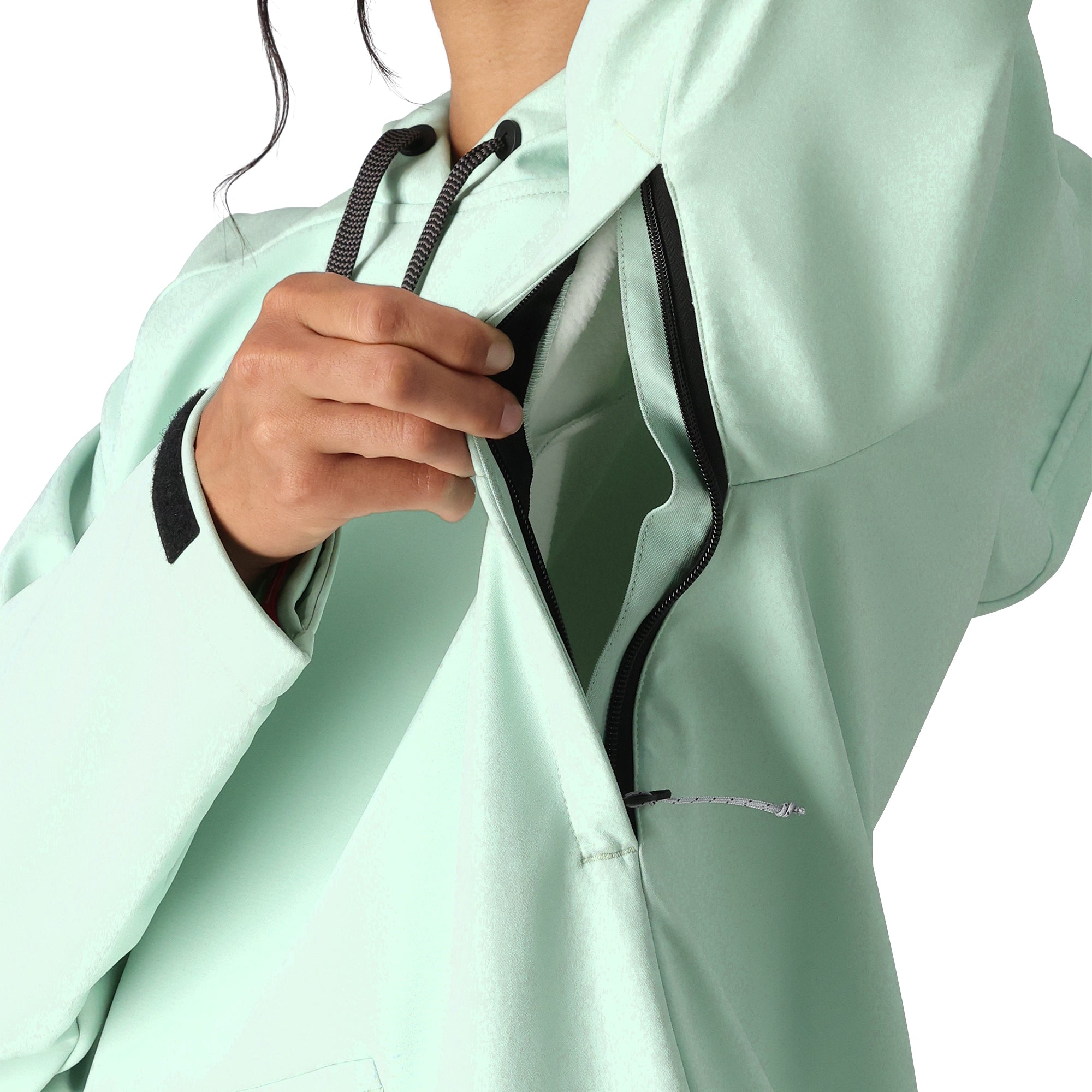 The 686 Women's Waterproof Hoody 2025 in mint green showcases a black zipper and drawstring on its front.
