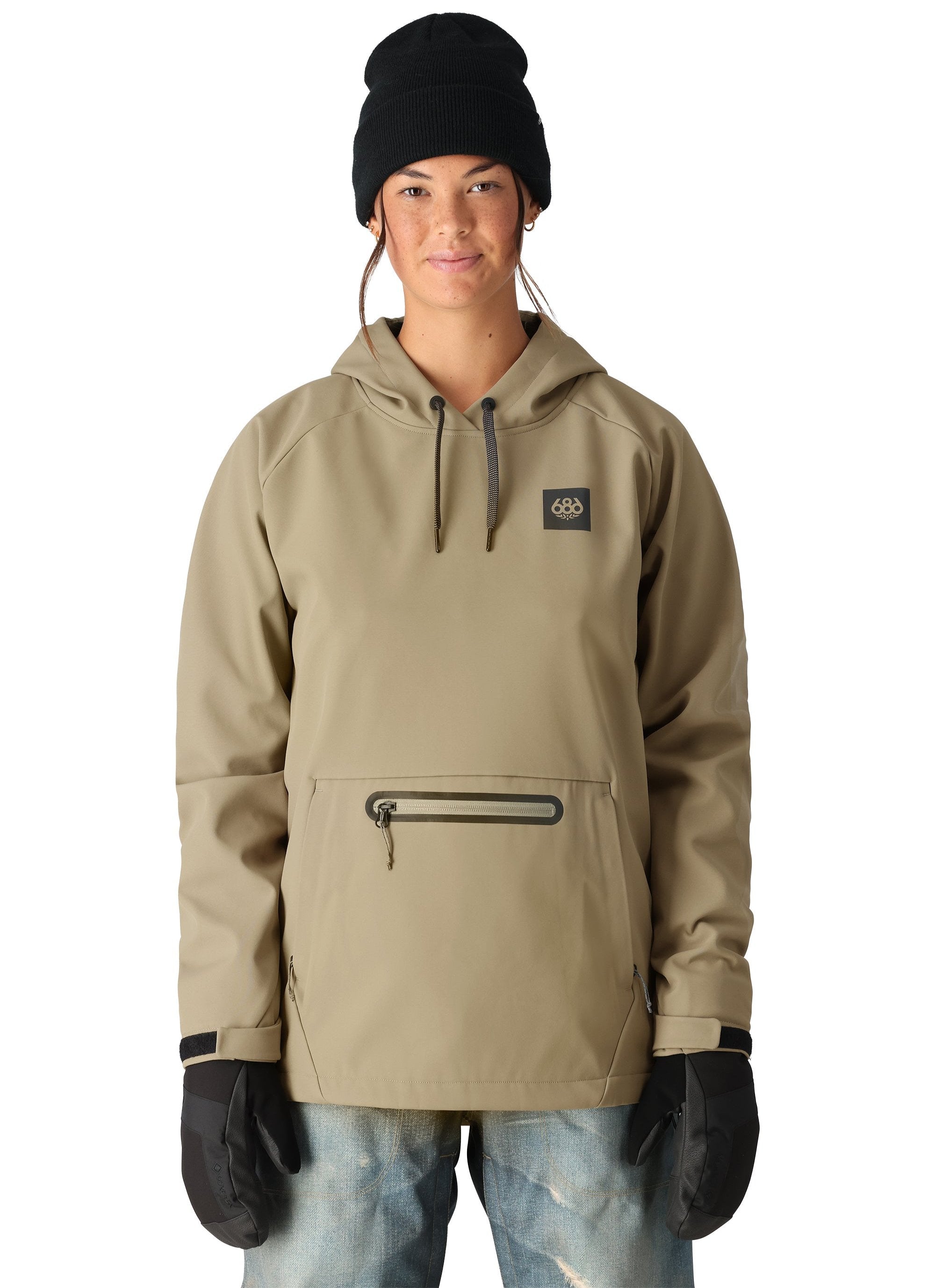 The 686 Women's Waterproof Hoody 2025 has a khaki-colored front view with a black logo on the chest and a drawstring hood.
