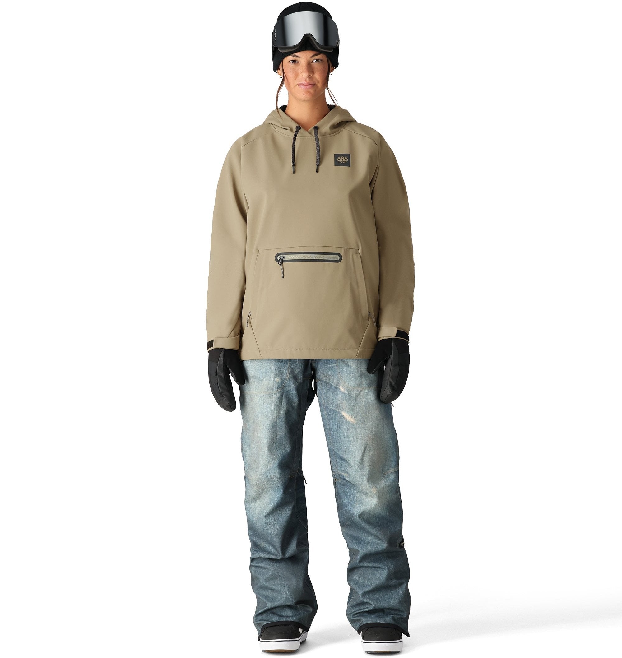 The 686 Women's Waterproof Hoody 2025 has a tan body with a black drawstring and logo on the left side of the chest.