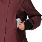 The 686 Whisper Insulated Jacket in burgundy has an insulated hood and zippered pockets.