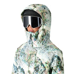 The 686 Whisper Insulated Jacket in white has a leaf print design with an insulated hood.