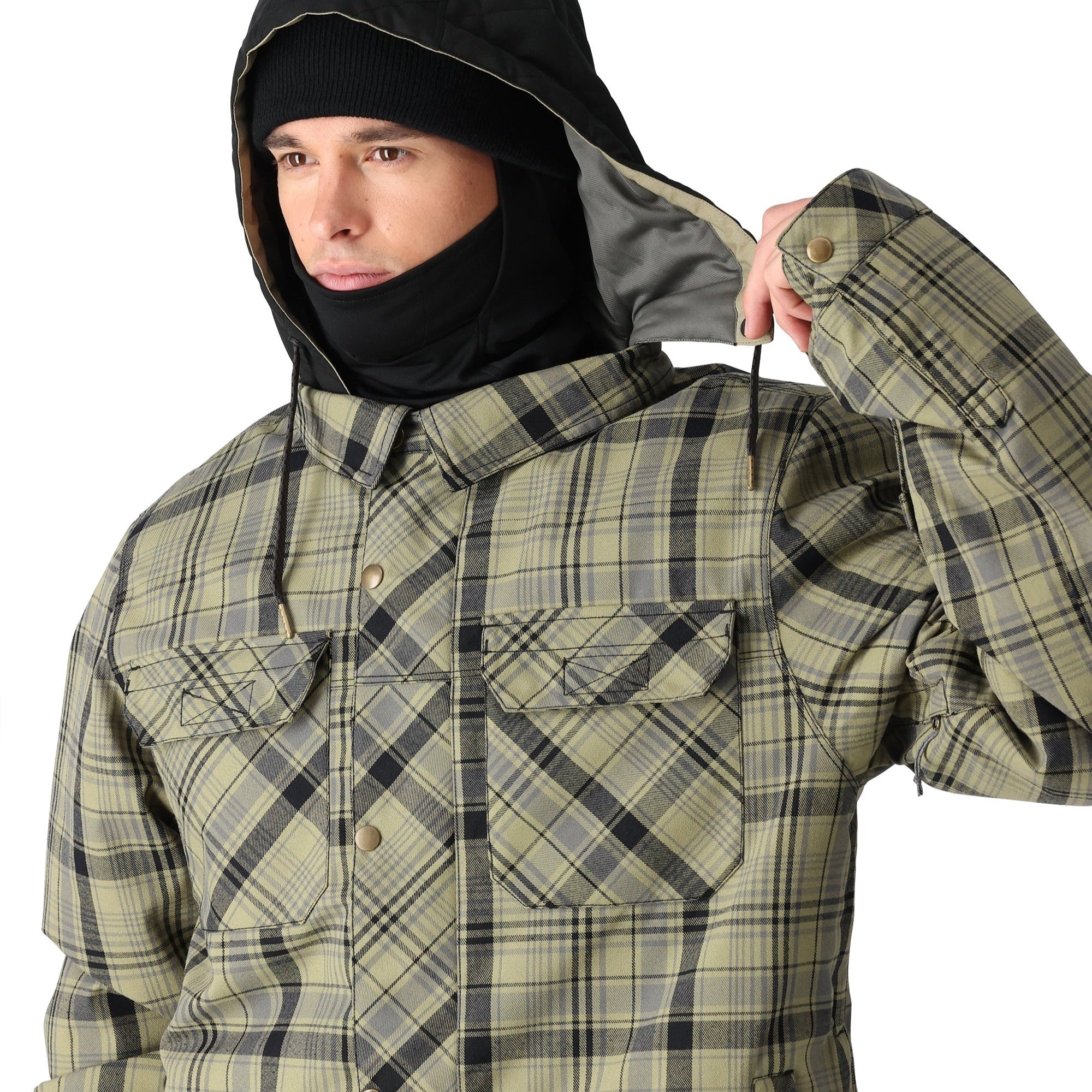 The 686 Woodland Insulated Jacket, visible from its front view, is predominantly khaki plaid with black and grey accents.