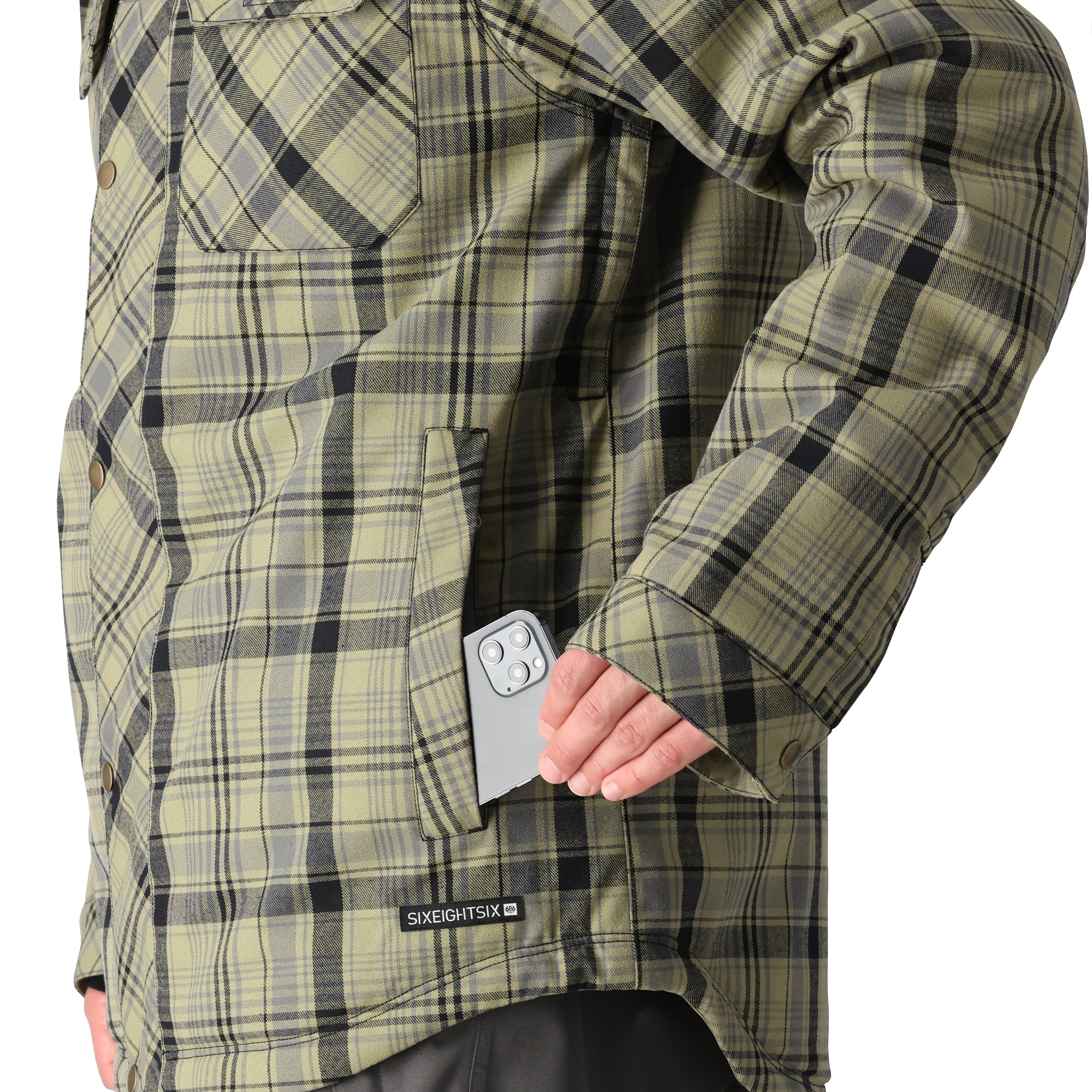 The 686 Woodland Insulated Jacket 2025 is olive green with an insulated hood and two chest pockets.