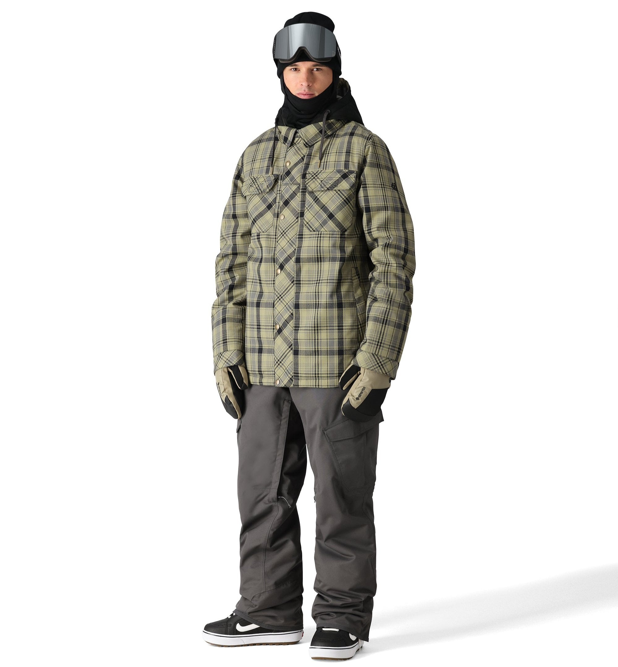 The 686 Woodland Insulated Jacket 2025 is shown from the front, wearing a plaid pattern in shades of green and black.